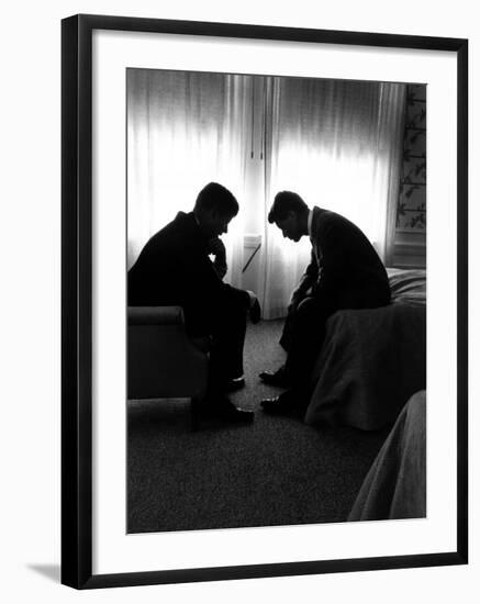 Jack Kennedy Conferring with His Brother and Campaign Organizer Bobby Kennedy in Hotel Suite-Hank Walker-Framed Photographic Print