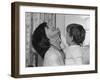 Jackie Kennedy Laughs as Her Son John Jr, Plays with Her Pearl Necklace, Nov.1962-null-Framed Photo