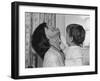 Jackie Kennedy Laughs as Her Son John Jr, Plays with Her Pearl Necklace, Nov.1962-null-Framed Photo