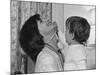 Jackie Kennedy Laughs as Her Son John Jr, Plays with Her Pearl Necklace, Nov.1962-null-Mounted Photo