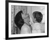 Jackie Kennedy Laughs as Her Son John Jr, Plays with Her Pearl Necklace, Nov.1962-null-Framed Photo