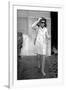 Jackie Kennedy Onassis (Nina Ricci Sunglasses, Gucci Bag) Leaving Crillon Hotel, Paris, 1970-null-Framed Photo