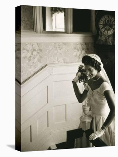 Jackie Kennedy Throwing the Bouquet-Toni Frissell-Stretched Canvas