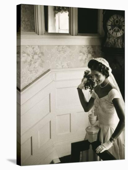 Jackie Kennedy Throwing the Bouquet-Toni Frissell-Stretched Canvas