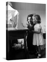 Jackie Kennedy, Wife of Sen, and Daughter Caroline Watching Bird in Cage, at Home-Alfred Eisenstaedt-Stretched Canvas