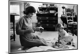 Jackie Kennedy, Wife of Sen, Cutting Out Newspaper Clippings Next to Open Scrapbook-Alfred Eisenstaedt-Mounted Photographic Print