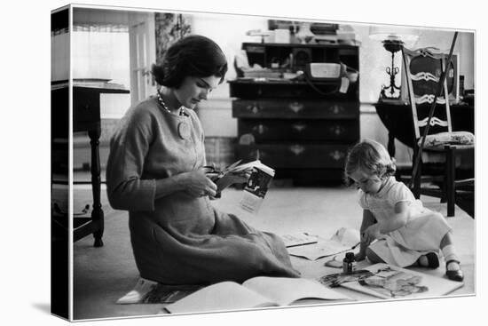 Jackie Kennedy, Wife of Sen, Cutting Out Newspaper Clippings Next to Open Scrapbook-Alfred Eisenstaedt-Stretched Canvas
