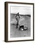 Jackie Kennedy, Wife of Sen, Walking Along Beach with Her Slicker Clad Daughter Caroline-Alfred Eisenstaedt-Framed Photographic Print