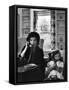 Jackie Kennedy, Wife of Senator John Kennedy, Talking on the Telephone as her daughter mimics her-Alfred Eisenstaedt-Framed Stretched Canvas