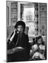Jackie Kennedy, Wife of Senator John Kennedy, Talking on the Telephone as her daughter mimics her-Alfred Eisenstaedt-Mounted Premium Photographic Print