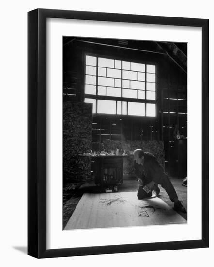 Jackson Pollock Working on a Painting-Martha Holmes-Framed Photographic Print