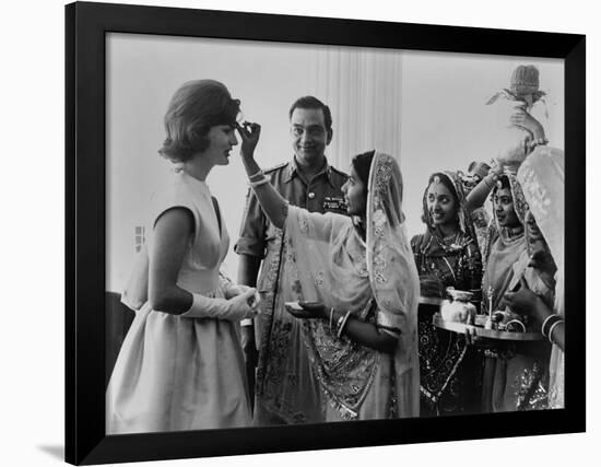 Jacqueline Kennedy Having a 'Bindi' Placed on Her Forehead at Jaipur, India-null-Framed Photo