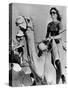 Jacqueline Kennedy Onassis Riding a Camel While on Vacation in Egypt, March 28, 1974-null-Stretched Canvas