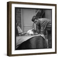 Jacques Brel Cuddling His Cat, September 1959-Marcel Begoin-Framed Photographic Print