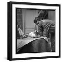 Jacques Brel Cuddling His Cat, September 1959-Marcel Begoin-Framed Photographic Print