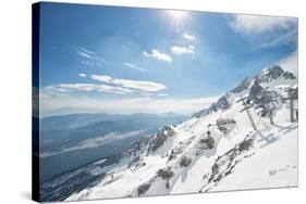 Jade Dragon Snow Mountain with Blue Cable Cars and View on the Lower Regions of Yunnan, China, Asia-Andreas Brandl-Stretched Canvas