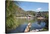 Jade Spring Park and Black Dragon Pool with Boat Carrying Wicker Baskets-Andreas Brandl-Stretched Canvas