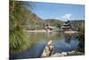 Jade Spring Park and Black Dragon Pool with Boat Carrying Wicker Baskets-Andreas Brandl-Mounted Photographic Print