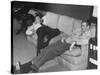 James Stewart Stretched Out on Office Sofa, Smiling, Producer Leland Hayward Slouches at Other End-John Florea-Stretched Canvas