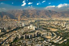 Aerial view of Tehran facing North towards the Alborz Mountains, Tehran, Iran, Middle East-James Strachan-Photographic Print