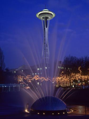 Wa, Seattle, International Fountain with Holiday Lights and the Space Needle