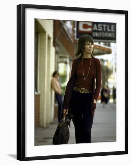 Jane Fonda Carrying a Louis Vuitton Bag as She Walks Down the Street-Bill Ray-Framed Premium Photographic Print