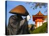 Japan, Honshu, Kansai Region, Kiyomizu-Dera, Shinto Priest Seeking Donations Wearing a Bamboo Hat-Gavin Hellier-Stretched Canvas