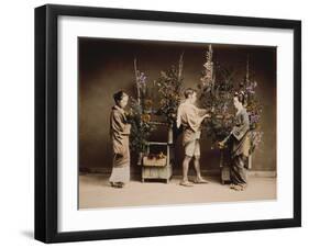 Japan, Japanese Women and Man Flower Arranging-null-Framed Giclee Print