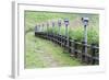Japan, Nara Prefecture, Soni Plateau. Wooden lanterns along a fence.-Dennis Flaherty-Framed Photographic Print