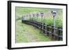 Japan, Nara Prefecture, Soni Plateau. Wooden lanterns along a fence.-Dennis Flaherty-Framed Photographic Print