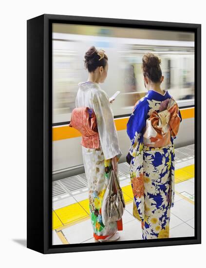 Japan, Tokyo, Girls in Kimono on Subway Platform-Steve Vidler-Framed Stretched Canvas