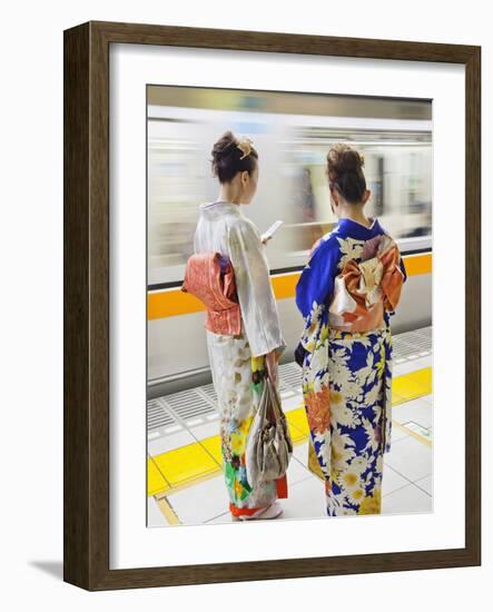 Japan, Tokyo, Girls in Kimono on Subway Platform-Steve Vidler-Framed Photographic Print