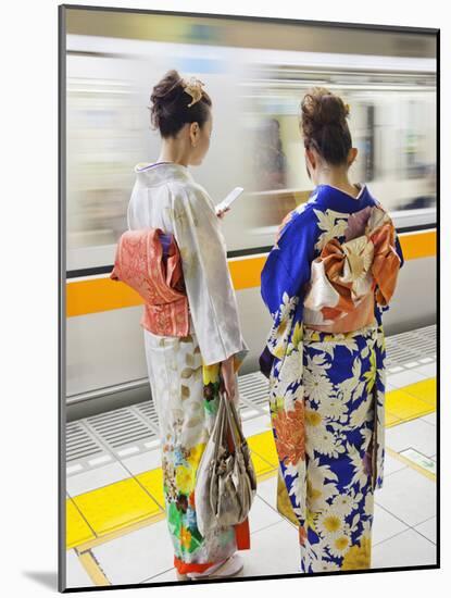 Japan, Tokyo, Girls in Kimono on Subway Platform-Steve Vidler-Mounted Photographic Print