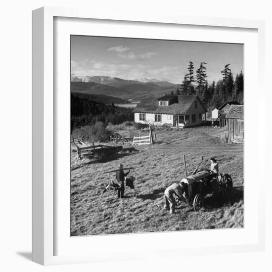 Japanese-American Family Working on their Farm after Returning from Internment Camps-null-Framed Photographic Print