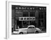 Japanese American shop owner in Oakland, CA hopes to avoid internment after Pearl Harbor, 1942-Dorothea Lange-Framed Photographic Print