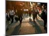 Japanese Commuters Walk Through a Tokyo Street on Their Way to the Train Stations-David Guttenfelder-Mounted Photographic Print