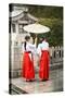 Japanese Girls in Red Hakama with Umbrella in Rain Kamakura Japan-Sheila Haddad-Stretched Canvas