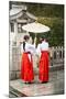 Japanese Girls in Red Hakama with Umbrella in Rain Kamakura Japan-Sheila Haddad-Mounted Photographic Print