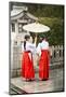 Japanese Girls in Red Hakama with Umbrella in Rain Kamakura Japan-Sheila Haddad-Mounted Photographic Print