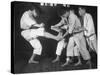 Japanese Karate Student Breaking Boards with Kick-John Florea-Stretched Canvas