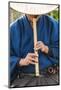 Japanese man playing traditional wooden flute, Kyoto, Japan-Peter Adams-Mounted Photographic Print