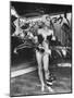 Japanese Nightclub Stripper Has a Clinging Plastic Dakkochan Doll Hanging to Her Leg-John Dominis-Mounted Photographic Print