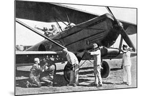 Japanese Plane Being Loaded with Bombs in Manchuria, 1933-Japanese Photographer-Mounted Photographic Print