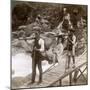 Japanese Woman in a Yamakago (Mountain Chai) Crossing the Torrential Daiya River Near Nikko, Japan-Underwood & Underwood-Mounted Photographic Print