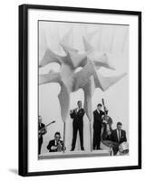 Jazz Drummer Chico Hamilton Playing with Band Behind Sculpture Called "Counterpoints"-Gordon Parks-Framed Premium Photographic Print