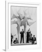 Jazz Drummer Chico Hamilton Playing with Band Behind Sculpture Called "Counterpoints"-Gordon Parks-Framed Premium Photographic Print