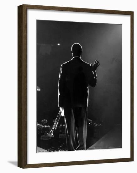 Jazz Trumpeter Louis Armstrong Waving to a Crowd of Adoring Fans as Their Applause Rolls over Him-John Loengard-Framed Premium Photographic Print