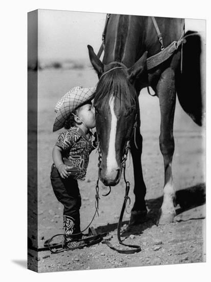 Jean Anne Evans, 14 Month Old Texas Girl Kissing Her Horse-Allan Grant-Stretched Canvas