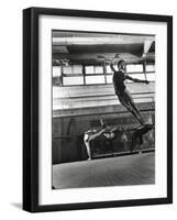 Jean Babilee, Star of Ballets Des Champs Elysees, Leaping During Practice as Other Dancers Watch-Gjon Mili-Framed Photographic Print