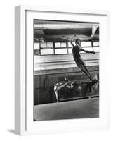 Jean Babilee, Star of Ballets Des Champs Elysees, Leaping During Practice as Other Dancers Watch-Gjon Mili-Framed Photographic Print